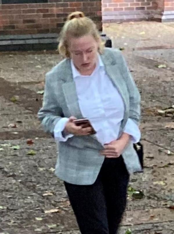 Elisa Timbers is seen walking outside of court 