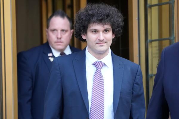 FTX founder Sam Bankman-Fried leaves Federal court, Wednesday, July 26, 2023, in New York.